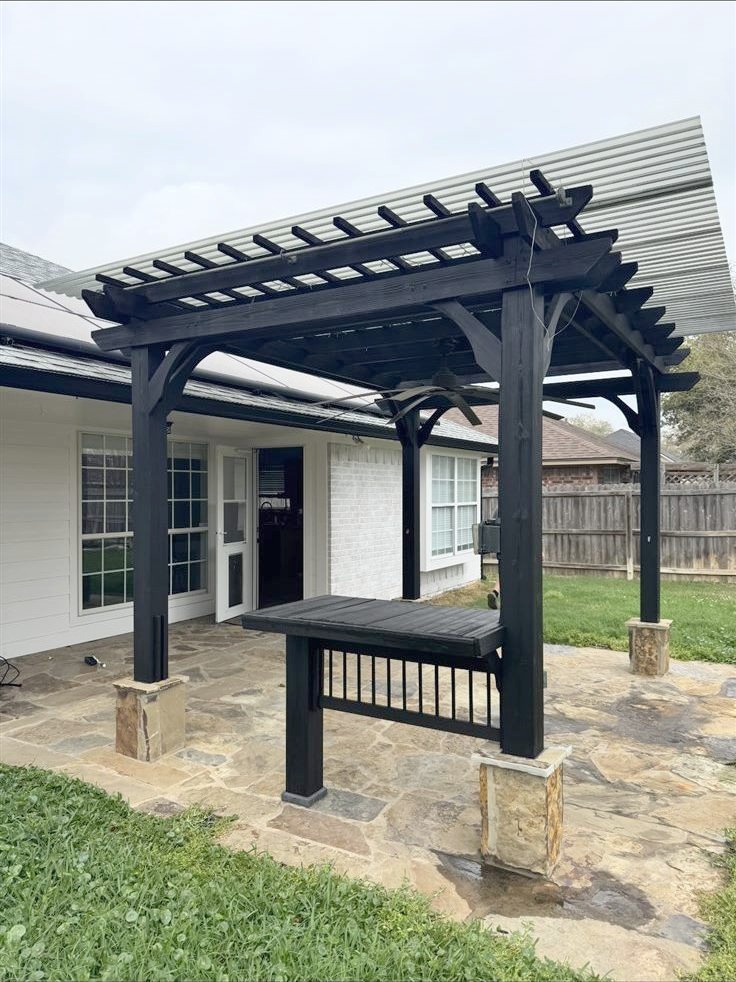 Backyard pergola after staining, clean dark protective coat, outdoor staining in Brazos Valley, TX
